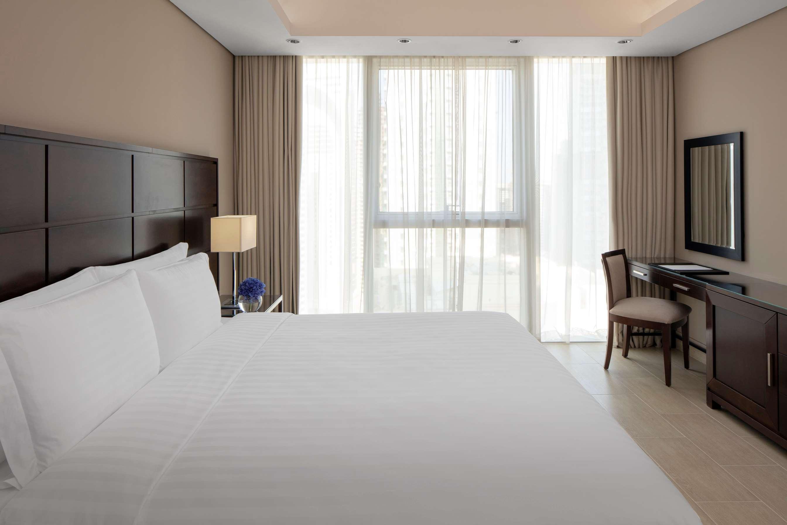 Dusit Doha Hotel מראה חיצוני תמונה A bedroom at the hotel