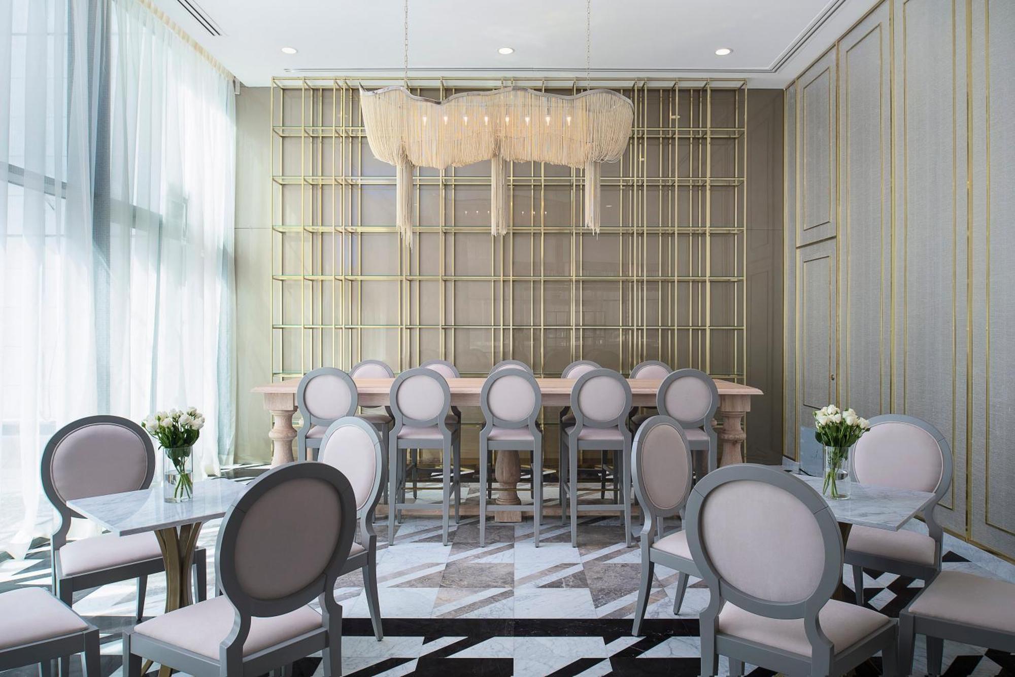 Dusit Doha Hotel מראה חיצוני תמונה The interior of the restaurant