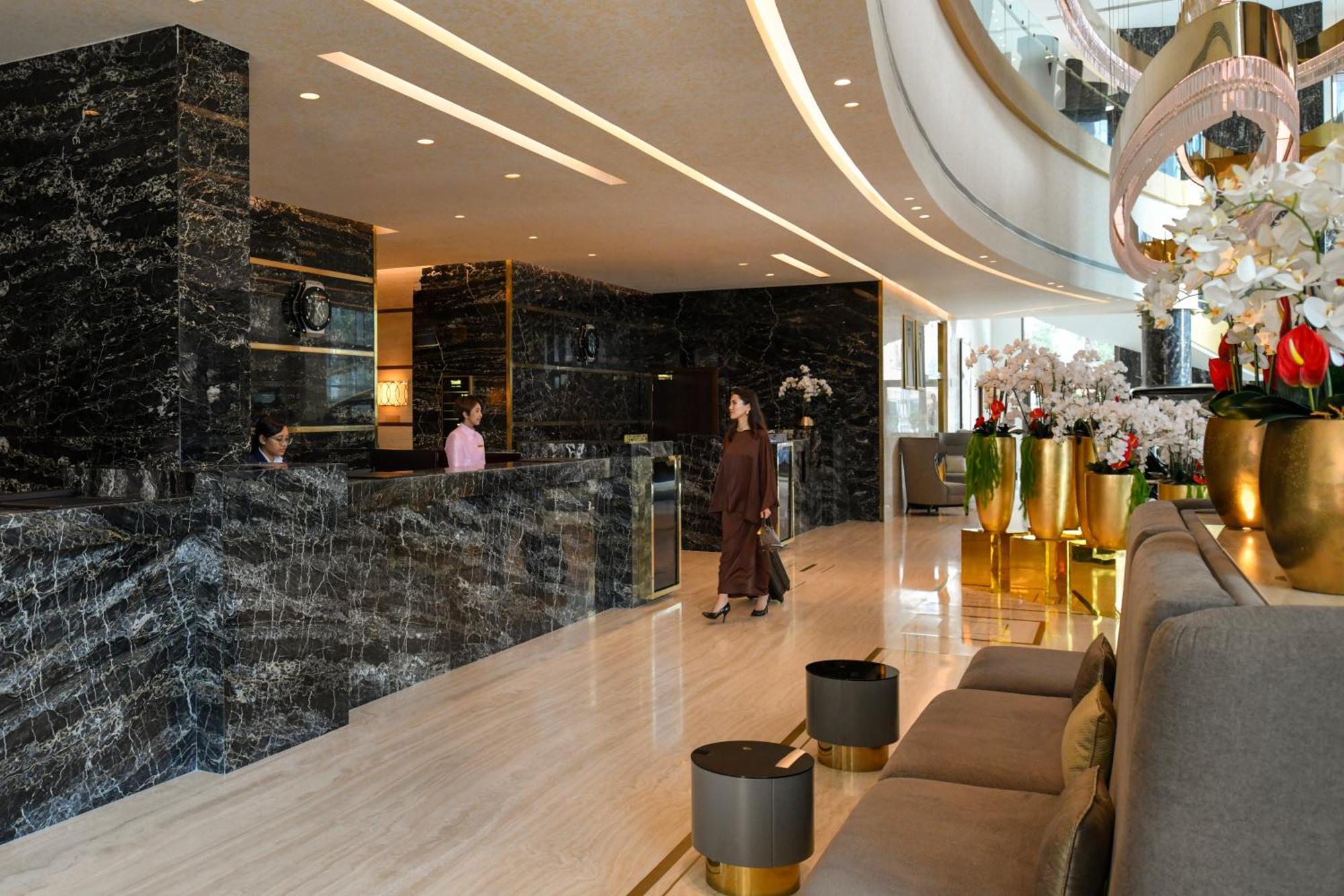 Dusit Doha Hotel מראה חיצוני תמונה The lobby of the hotel